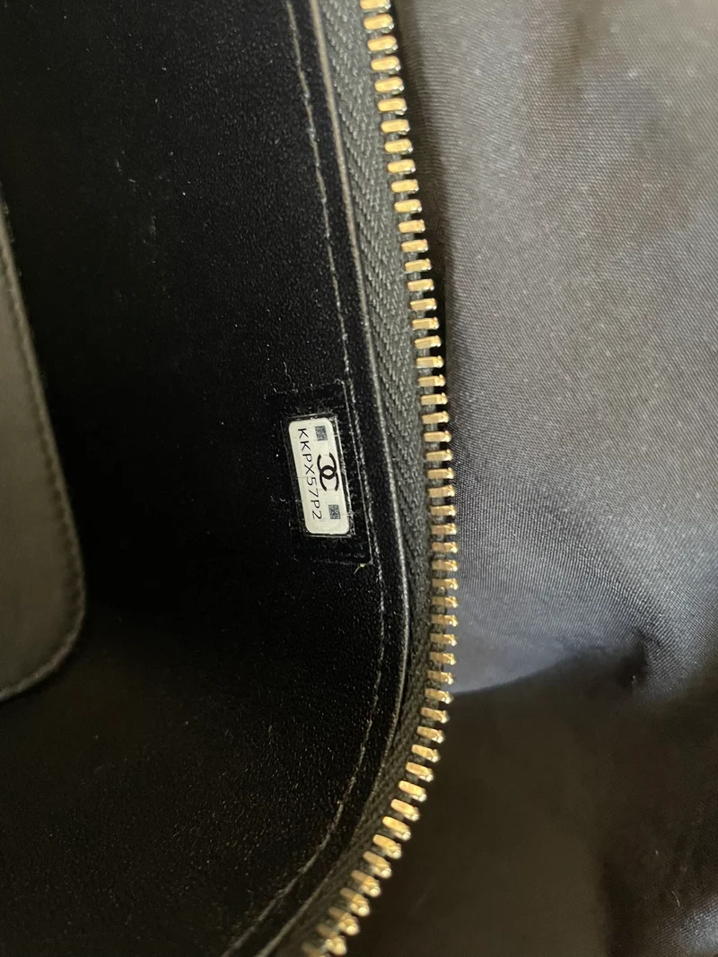 Klassischer Chanel Kosmetikkoffer aus schwarzem, gestepptem Lammleder mit Tragegriff