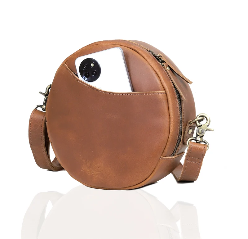Perry Tan Leather Circle Crossbody Bag