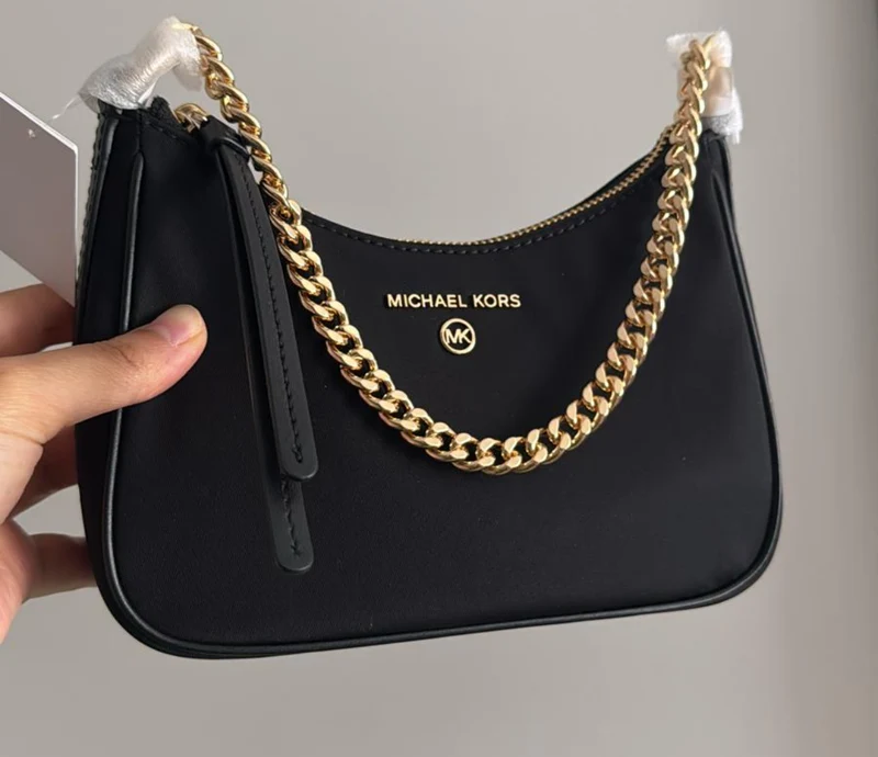 Mk whatsapp aktion charm schwarz klein