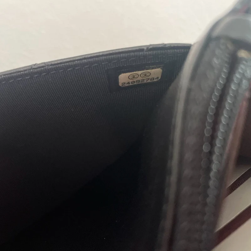 Chanel Schwarze Klassische Brieftasche mit Kette (WOC) 2018