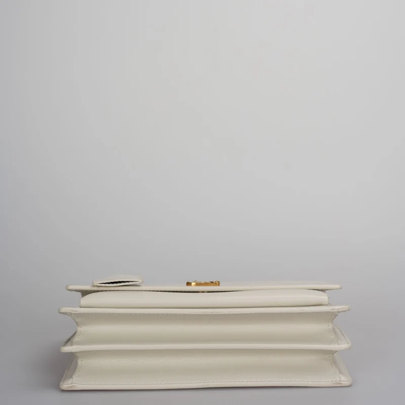 Saint Laurent Sunset Medium Bag aus weißem Kalbsleder mit goldenen Metallteilen