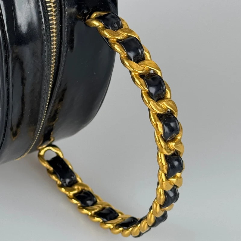 Chanel 1995 Schwarzer runder Kosmetikkoffer