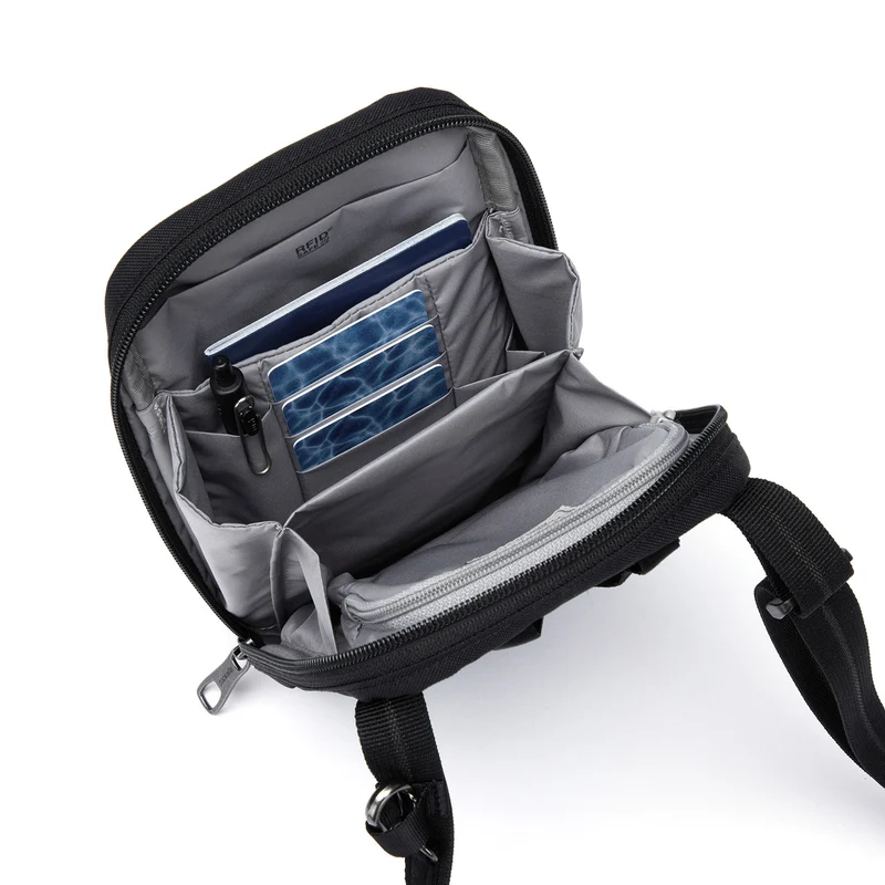 pacsafe RFIDsafe Tech Crossbody - Umhängetasche 22 cm (jet black)