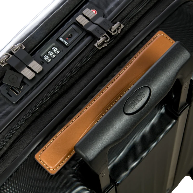 Brics Taormina - 4-Rollen-Kabinentrolley mit Vortasche 55 cm erw. USB (schwarz)