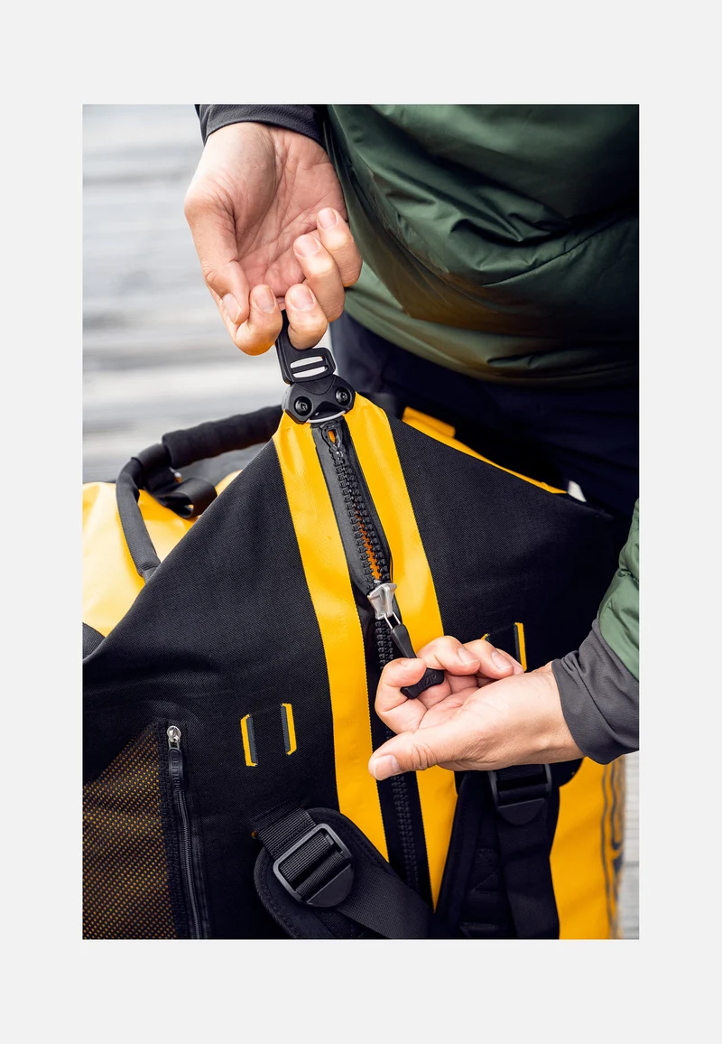 Duffle RS 110L Sonnengelb Schwarz - Reisetasche mit Rollen