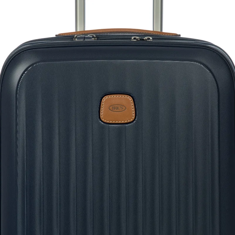 Brics Taormina - 4-Rollen-Kabinentrolley mit Vortasche 55 cm erw. USB (blau)